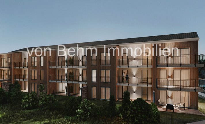 Moderne Wohnanlage mit Holz- und Putzfassade_2