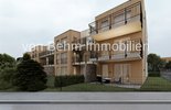 Moderne Wohnanlage mit Holz- und Putzfassade_3