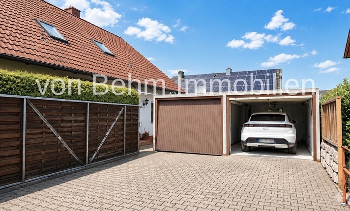 V015-2026_Doppelgarage mit vorgelagerten Stellplätzen