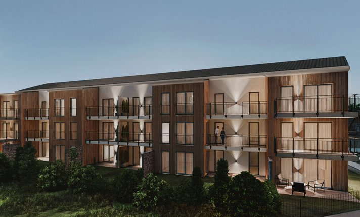 Moderne Wohnanlage mit Holz- und Putzfassade_2