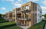 Moderne Wohnanlage mit Holz- und Putzfassade_1.1